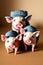 Three pigs wear hats and looking straight into the camera generated by ai