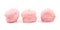 Three pink cream puffs in a row