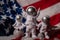 Three Plastic toys figure astronaut on American flag background Copy space. 50th Anniversary of USA Landing on The Moon