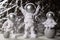 Three Plastic toys figure astronaut on silver background Copy space. Concept of out of earth travel, private spaceman
