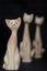 Three Porcelan Cat Figurines With Long Necks