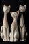 Three Porcelan Cat Figurines With Long Necks