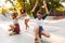 Three positive young girls with skateboards