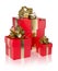 Three present red with golden ribbon isolated