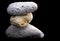 Three pumice stones on black