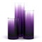 Three purple glass vases isolated on white