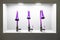 Three purple kitchen faucets in the shop window, modern style, design