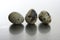 Three quail eggs