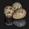 Three quail eggs