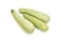 Three raw zucchinis isolated on white