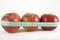 Three red apple and green measurement tape