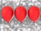 Three red balloons