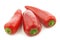 Three red jalapeno peppers `capsicum`