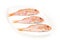 Three Red Mullets seafood on a white oval dish