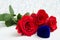 Three red Roses and jewelery present box with boke Background. copy space - Valentines and 8 March Mother Women's Day concept
