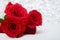 Three Red Roses and jewelery present box with boke Background. copy space - Valentines and 8 March Mother Womens Day concept