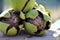 Three ripe walnuts close up