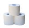 three rolls of white tissue paper or napkin in stack prepared for use in toilet or restroom isolated on white background with