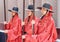 Three royal guards wearing red Jeonbok at Gyeongbokgung Palace