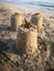 Three sand castle on the beach