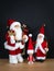 Three Santa Claus figures