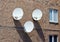 Three satellite antennas on the home