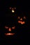 Three scary jack o\'lanterns vertical
