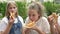 Three schoolchildren enjoy pizza during the break at school.