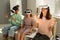 Three schoolgirls in vr headsets watching 3d presentation