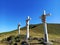 Three Sculptures of Jesus Christ on white crosses.