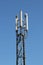 Three-sector mobile telephone base station on lattice girder tower