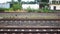 three sets of railroad tracks run straight