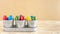 Three silver pots with colorful easter eggs