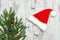 Three silvery gift boxes, decorated with a Christmas tree and a