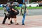 Three skaters of different ages communicate and go for a ride