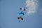 Three skydivers in the air