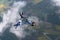 Three skydivers in freefall