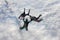 Three skydivers in freefall