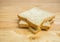 Three slice whole wheat bread stacked on table