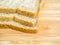 Three slice whole wheat bread on wooden table