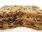 Three slices of sponge cake with raisins, organic, biological isolated on white background. Wholemeal spelled bread made by hand,