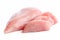 Three slices of uncooked boned chicken breast next to whole chicken breast isolated on white