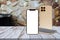 Three smartphones on an old wooden table