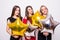 Three smiling gourgeous girls with balloons in night dresses