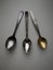 Three spoons on white background