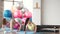 Three sporty girls doing fitness on mats in a gym