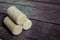 Three Stacked Cork Stoppers on a Old Barn Board Floor