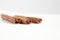 Three sticks of cinnamon lie on a white background