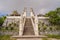 Three stone ladders in beautiful Pura Lempuyang Luhur temple. Summer landscape with stairs to temple. Paduraksa portals