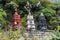 Three stone stupas.
